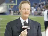  ?? JAMES D. SMITH, ICON SMI ?? Ed Werder, among the 100 ESPN employees let go Wednesday, works the sidelines in 2007.