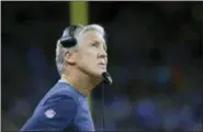  ?? PAUL SANCYA — THE ASSOCIATED PRESS ?? Seattle Seahawks head coach Pete Carroll watches during an NFL football game against the Detroit Lions in Detroit, Sunday.