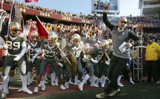  ?? Associated Press ?? When P.J. Fleck became the coach at Minnesota three years ago, he targeted this season as the one the Golden Gophers could become contenders. Entering Saturday’s game against Penn State, he has them at 8-0 and at No. 13 in the Associated Press poll.