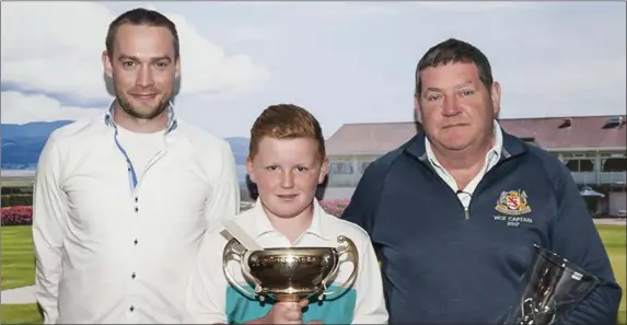  ??  ?? Dundalk Minor Scratch Cup winner Ben Caffrey with Martin Lambe (Martin Lambe Plant Hire) and Vice Captain Gerry Byrne.