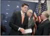  ?? AP PHOTO/J. SCOTT APPLEWHITE ?? House Speaker Paul Ryan of Wisconsin, joined by House Majority Whip Steve Scalise of Louisiana, right, and Rep. Greg Walden, R-Ore., departs a news conference after responding to reporters about the ouster of Michael Flynn, President Trump’s national...