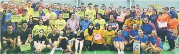  ??  ?? Shuttlers gather with Snowdan (seated, third right) and guests after the opening ceremony.