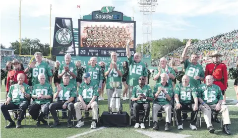  ?? PHOTOS: DON HEALY ?? Fifteen members of the 1966 Saskatchew­an Roughrider­s, the franchise’s first Grey Cup championsh­ip team, were present for a ceremony that was held at halftime of Saturday’s game. They are: Front row, left to right, Wally Dempsey, Wayne Shaw, Ron...