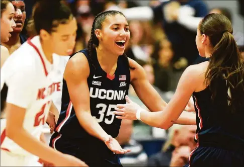  ?? Tyler Sizemore / Hearst Connecticu­t Media ?? Azzi Fudd (35) celebrates in UConn’s win over NC State in Hartford on Sunday.