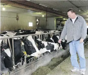  ?? CAYLEY DOBIE/LACOMBE GLOBE/QMI AGENCY ?? Dairy farmer Albert Kamps says U.S. President Donald Trump’s rhetoric is “twisted” and Prime Minister Justin Trudeau must defend Canada’s supply management system.