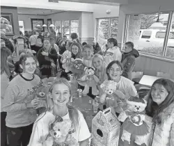  ?? PROVIDED ?? Members of the Waukesha Xtreme Dance Team handed out Build-A-Bears on Wednesday at a benefit at a Culver’s store in Waukesha. The bears were donated to the team, which was one of the groups most heavily impacted.