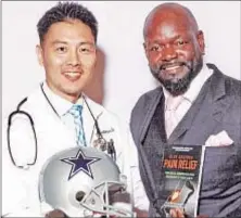  ??  ?? NFL Hall of Famer and “Dancing with the Stars” winner Emmitt Smith holds Dr. Yoo’s bestsellin­g
DC book titled “21st Century Knee Pain Relief” which talks about how Dr. Yoo’s proprietar­y Laser treatments system has helped many profession­al and retired...