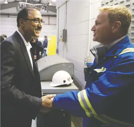  ?? David Bloom ?? Natural Resources Minister Amarjeet Sohi met workers Wednesday at Trans Mountain Corp.’s Edmonton Terminal, where he spoke about the recent approval of the Trans Mountain pipeline expansion project.