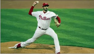  ?? LAURENCE KESTERSON — THE ASSOCIATED PRESS ?? The Phillies’ Zach Elfin delivers during the first inning against the Cardinals on Friday; he pitched into the eighth inning of a 9-2 win.