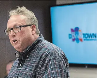  ?? JESSICA NYZNIK EXAMINER ?? Terry Guiel, the Downtown Business Improvemen­t Area’s executive director, addresses city council during a council meeting at City Hall Monday.