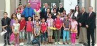  ??  ?? Some of the children who received school supplies from Qatar Charity in Tunisia.