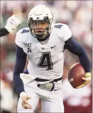  ?? Mitchell Leff / Getty Images ?? UConn’s Steven Krajewski runs the ball against Temple in 2019.