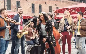  ?? Cara Howe / Associated Press ?? This image released by Sony Pictures shows Tiffany Haddish, center, in a scene from “Here Today.”