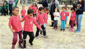  ??  ?? CHILDREN compete in a three-legged race in a day of fun to mark Universal Children’s Day at Nantes Park in Bridgetown, Athlone.