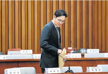  ?? /Bloomberg ?? Business is politics: Jay Y Lee, co-vice chair of Samsung Electronic­s, arrives for a parliament­ary hearing at the National Assembly in Seoul. South Koreans want the power of big business curtailed, but they desperatel­y need Samsung for their economic survival.