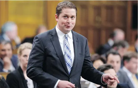  ?? JUSTIN TANG/THE CANADIAN PRESS ?? Andrew Scheer’s Conservati­ves have interprete­d Ontario’s vote for Doug Ford as an explicit rejection of the carbon tax, John Ivison says.