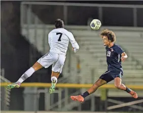  ?? PHOTOS BY RYAN DOWD/SPECIAL TO TCPALM ?? Centennial's Adrian Hammond (19) attempts a header in a District 10-7A semifinal against Treasure Coast on Monday at the South County Regional Sports Complex in Port St. Lucie.