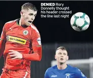  ??  ?? DENIED Rory Donnelly thought his header crossed the line last night