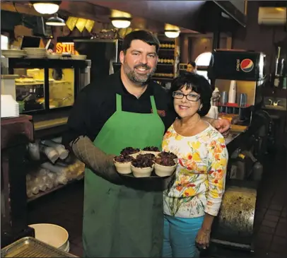  ?? The Sentinel-Record/File photo ?? FINE FOOD: Owners Chris Dunkel, left, and his mother, Susan Whittaker.