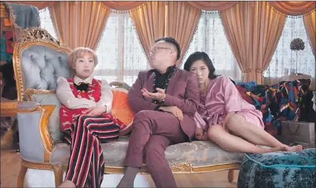  ?? Warner Bros. Pictures ?? PIEK LIN (Awkwafina), left, Oliver (Nico Santos) and Rachel (Constance Wu) in “Crazy Rich Asians,” which has an all-Asian cast.
