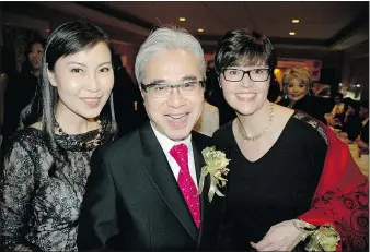  ??  ?? Loretta Lai, Paul Oei and Ann Adams welcomed about 800 guests to the gala, an annual dinner and auction in support of Mount Saint Joseph Hospital.