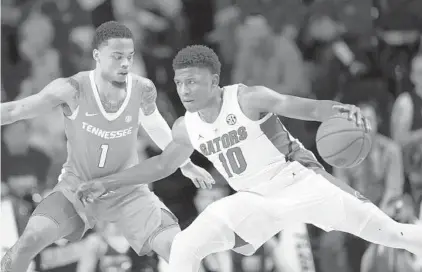  ?? MATT STAMEY/AP ?? Freshman guard Noah Locke scored 16 points for Florida in its home loss to top-ranked Tennessee on Jan. 12. The teams meet again Saturday.