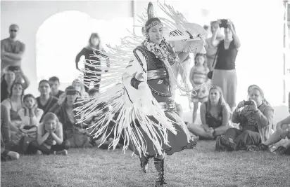  ?? WAYNE CUDDINGTON FILES ?? Fancy Shawl dancer Marissa Mills performs during the summer solstice during National Aboriginal Day in Ottawa in 2017. Tamara Ainscow points to three common stereotype­s about Indigenous peoples that must be challenged.