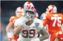  ?? BUTCH DILL/AP ?? Alabama defensive lineman Raekwon Davis (99) and his teammates proved even with injuries, they are a formidable unit.