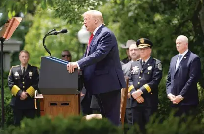  ?? EVAN VUCCI/AP ?? President Donald Trump speaks during an event on police reform Tuesday in the Rose Garden of the White House.