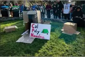  ?? ?? Cal Poly Homeless, a student-run organizati­on that was formed in response to recent housing policy changes at Cal Poly Humboldt, displays cardboard boxes on the campus quad as a representa­tion of student homelessne­ss, on Feb. 8.
