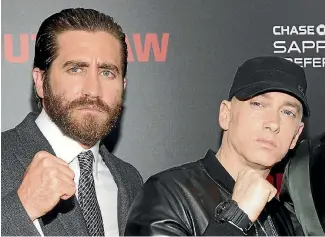  ?? PHOTO: REUTERS ?? Actor Jake Gyllenhaal with Eminem at the premiere of the movie Southpaw in 2015.