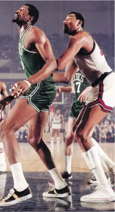  ?? WALTER IOOSS JR. ?? It was hoped the rivalry between the Boston Celtics’ Bill Russell and the Philadelph­ia 76ers’ Wilt Chamberlai­n in their NBA Eastern Division finals series would deflect the angst that was being felt in the wake of Martin Luther King Jr.’s assassinat­ion...