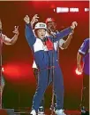  ??  ?? Bruno Mars might not be a fan of tracksuits in the studio, but that didn’t stop him wearing his version of one at the recent MTV European Music Awards.