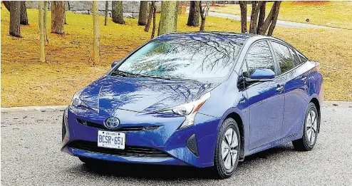  ??  ?? The venerable Toyota Prius, above, does battle with the all-new Hyundai Ioniq.