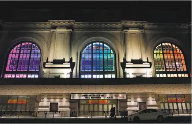  ?? Scott Strazzante / The Chronicle 2019 ?? San Francisco’s Bill Graham Civic Auditorium, shown adorned in rainbow colors for Gay Pride Month last year, may be transforme­d into an emergency homeless shelter during the coronaviru­s pandemic.