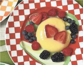  ??  ?? Lemon pudding with fresh berries is simple and luscious and can be eaten at various temperatur­es.
For garnish: Wash and pat dry:
