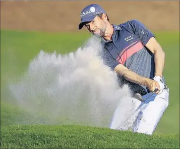  ?? Tannen Maury EPA/Shuttersto­ck ?? WEBB SIMPSON DIDN’T have much trouble during the third round of the Players Championsh­ip, but when he needed a good bunker shot on the 18th hole, he got up and down to save par for a 68 and 19-under total.