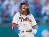  ?? PATRICK SMITH/GETTY ?? The Phillies’ Brandon Marsh reacts after a double against the Braves during Game 4 of the NLDS on Saturday at Citizens Bank Park in Philadelph­ia.