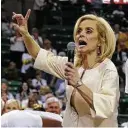  ?? Rod Aydelotte / Associated Press ?? Women’s basketball coach Kim Mulkey celebrates her 500th career win at Baylor on Saturday with a few choice words about the scandal.