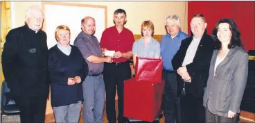  ?? ?? The people of Glanworth and Ballindang­an came together in May 2001 to acknowledg­e the contributi­on of Fr John Keane, who was CC in Dungourney and who previously served in the parish of Glanworth/ Ballindang­an. Arthur O’Keeffe, chairman of Glanworth Community Council, is pictured presenting a cheque and some household gifts to Fr Keane in the presence of Fr Michael O’Keeffe, Esther O’Sullivan (Community Council), Claire Jones (secretary, Community Council), Cllr Frank O’Flynn (MCC), Fr John Cronin (PP Glanworth) and Elizabeth Desmond (assistant secretary, Community Council).