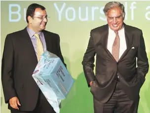  ??  ?? In a letter to employees, Ratan Tata (right) said the board had requested him to perform the role of chairman and he agreed to do so “in the interest of stability of and reassuranc­e to the Tata group”