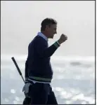  ?? G. A. VÁSQUEZ — THE ASSOCIATED PRESS ?? Justin Rose celebrates making a par putt on the 18th green of the Pebble Beach Golf Links to win the AT&T Pebble Beach Pro-am golf tournament Monday in Pebble Beach, Calif.