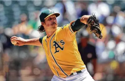  ?? Don Feria / Getty Images ?? A’s pitcher Daniel Mengden, a Westside High graduate, was fixated on increasing the velocity of his fastball growing up, saying “scouts are way more excited” about fireballer­s.