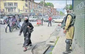  ?? PTI ?? A security personnel stands guard in Srinagar on Thursday. Authoritie­s beefed up security ahead of the first death anniversar­y of slain Hizbul Mujahideen commander Burhan Wani on Saturday.