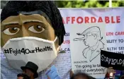  ?? — AFP ?? Protesters march at a rally to save the Affordable Care Act in Los Angeles on Thursday.