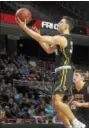  ?? GENE WALSH — DIGITAL FIRST MEDIA ?? CB West’s Collin MacAdams goes to the basket against Plymouth Whitemarsh Tuesday night.