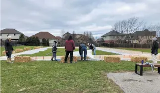  ??  ?? It was a community effort to build and maintain the outdoor rink.