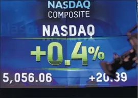  ?? Seth Wenig
Associated Press ?? NASDAQ’S climb from the Great Recession can be attributed to earnings and revenue growth, analysts said. Above, Nasdaq market data displayed in New York.