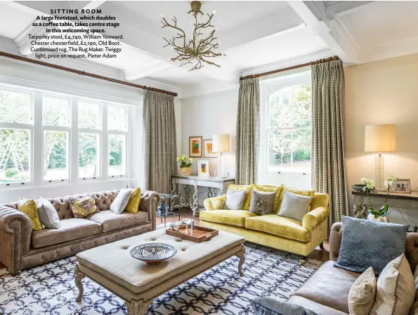  ?? ?? SITTING ROOM
A large footstool, which doubles as a coffee table, takes centre stage in this welcoming space. Tarporley stool, £4,740, William Yeoward. Chester chesterfie­ld, £2,190, Old Boot. Customised rug, The Rug Maker. Twiggy light, price on request, Pieter Adam