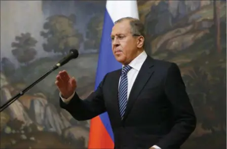  ?? ALEXANDER ZEMLIANICH­ENKO — THE ASSOCIATED PRESS ?? Russian Foreign Minister Sergey Lavrov prepares to speak in Moscow, Russia, Thursday. Russia’s foreign minister says Moscow will expel the same number of diplomats from the nations that have expelled Russian diplomats over the poisoning of an...